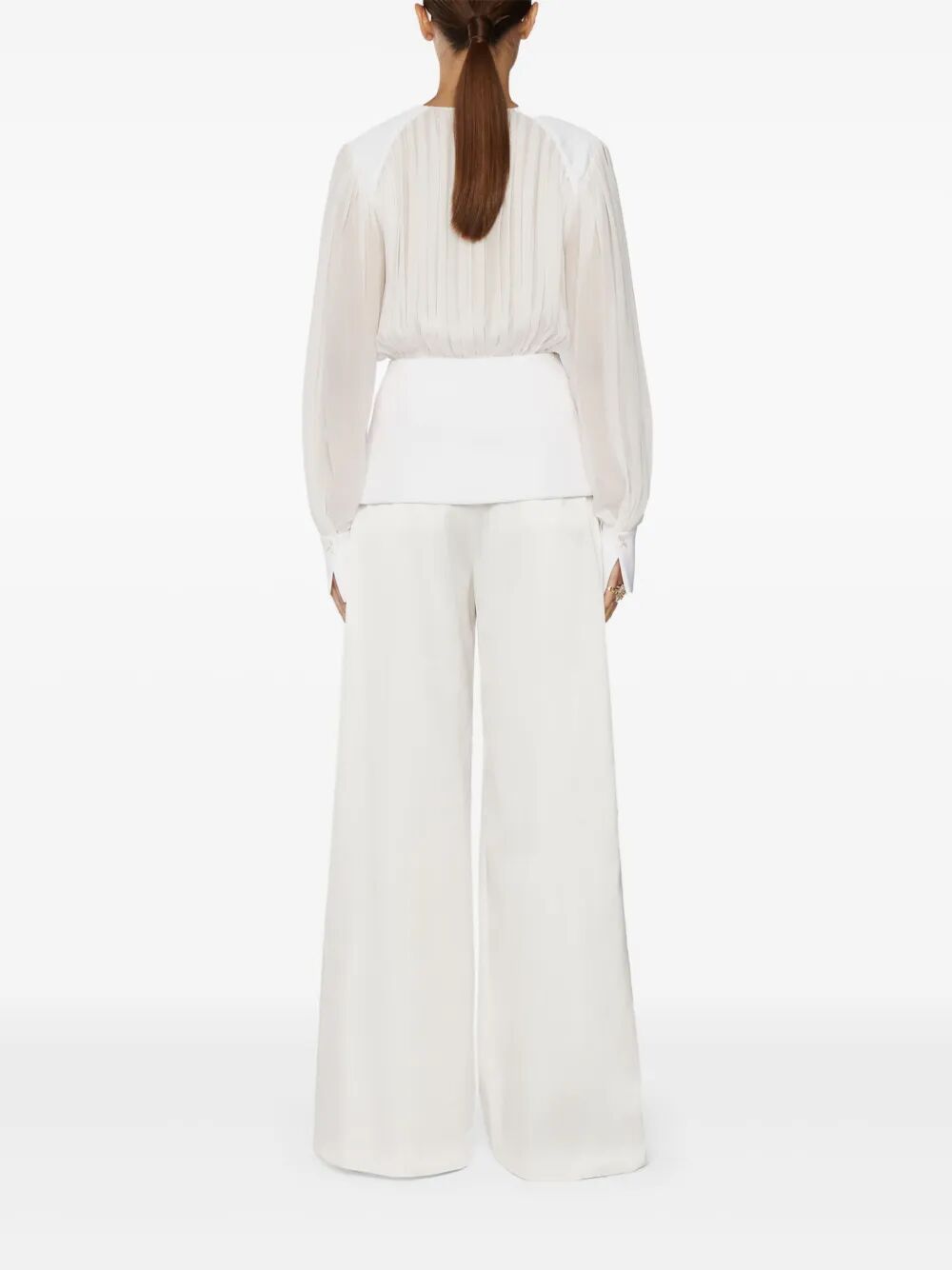 Blusa con inserti a contrasto