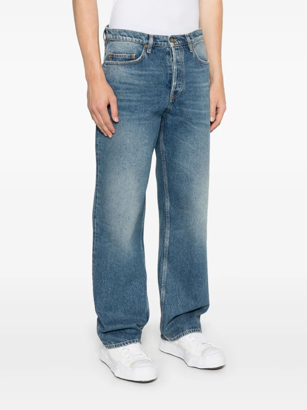 Jeans con baffatura