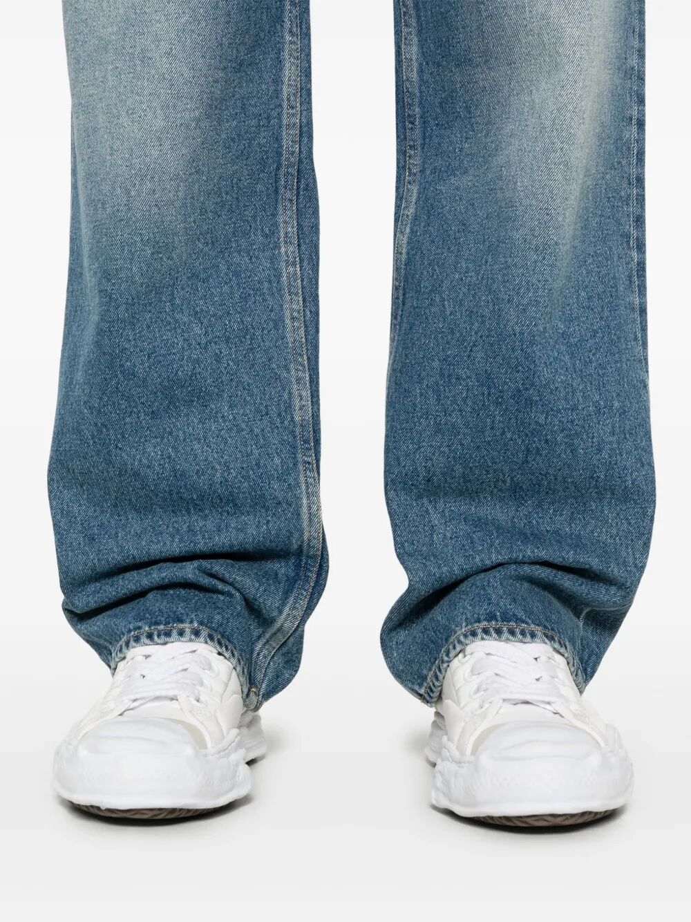 Jeans con baffatura