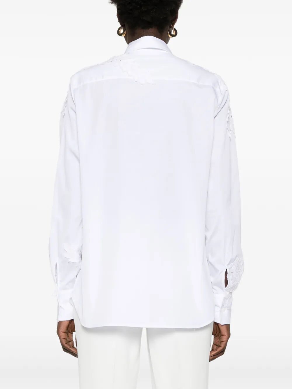 Camicia semi trasparente con applicazione a fiori
